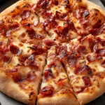 Delicious barbecue bacon pizza topped with cheese and crispy bacon