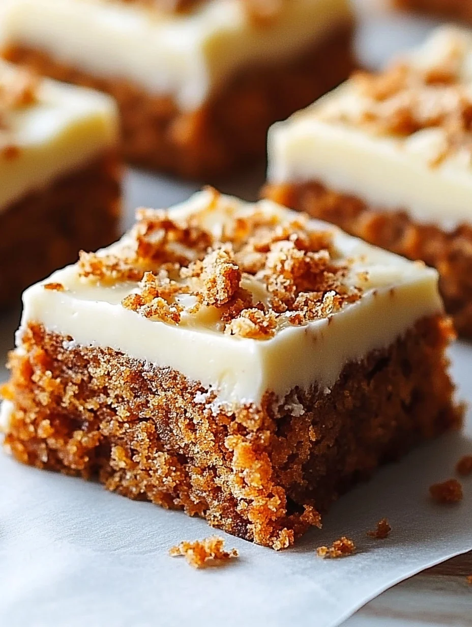Delicious homemade carrot cake bars topped with cream cheese frosting