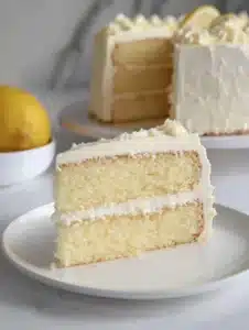 Cheesecake Factory Italian Lemon Cream Cake 3 Slice of Italian Lemon Cream Cake from the Cheesecake Factory on a plate