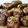 Garlic butter steak bites served in a skillet