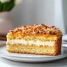 Delicious slice of German Bee Sting Cake with honey and almond topping
