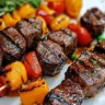 Delicious grilled steak kabobs with colorful vegetables on skewers