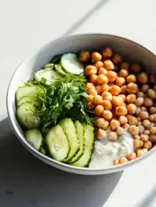 Healthy grain bowls with chickpeas and tahini dressing for a nutritious meal
