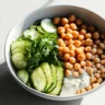 Healthy grain bowls with chickpeas and tahini dressing for a nutritious meal