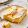 Delicious gooey butter cake with a rich cream cheese layer and buttery crust.