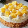 Juicy Pineapple Heaven Cake topped with fresh pineapple and cream