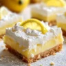 Lazy Day Lemon Cream Pie Bars with vibrant lemon topping and a graham cracker crust