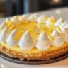 Delicious homemade lemon cream cheese pie with a golden crust and fresh lemon zest.