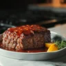 Delicious Makes You Feel Better Meatloaf served with mashed potatoes and veggies.