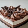 Delicious no-bake chocolate cream pie topped with whipped cream and chocolate shavings