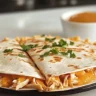 Delicious homemade Taco Bell Chicken Quesadilla copycat with melted cheese and chicken
