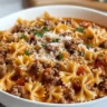 Creamy Velveeta beef pasta with bowtie noodles served in a bowl
