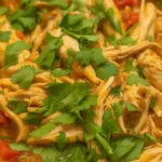 Delicious Chicken Taco Cheese Bowl topped with shredded cheese and fresh ingredients