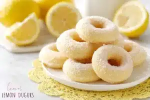 Fluffy lemon sugar baked donuts fresh out of the oven, topped with sweet lemon glaze.
