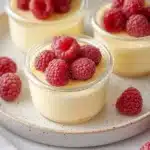 No-Bake Greek Yogurt Jello Cheesecake topped with colorful fruit garnish