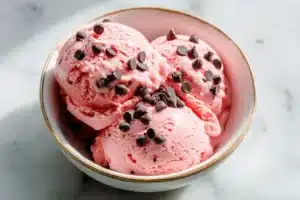 Strawberry Cheesecake Ice Cream: A Deliciously Easy Recipe 6 Delicious strawberry cheesecake ice cream in a waffle cone