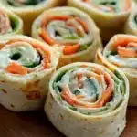 Colorful Vegetable Tortilla Roll Ups filled with fresh veggies and herbs