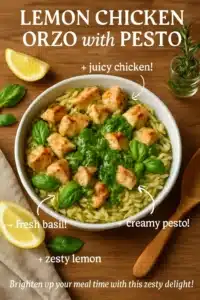 Plate of Lemon Chicken Orzo with Pesto, garnished with fresh herbs.