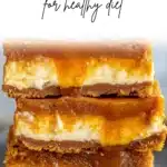 Caramelized pumpkin cheesecake bars topped with a creamy pumpkin layer and caramel drizzle.
