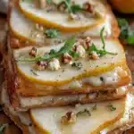 Elegant Pear and Gorgonzola Flatbread topped with fresh pears and blue cheese