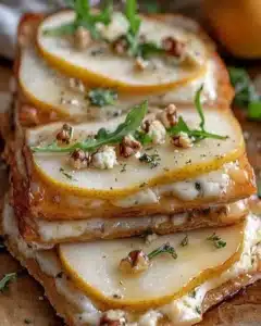 Elegant Pear and Gorgonzola Flatbread topped with fresh pears and blue cheese