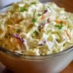 Delicious homemade KFC-style coleslaw served in a bowl.