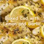 Delicious baked cod with lemon and garlic, served on a white plate.