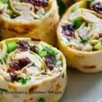 Delicious creamy cranberry chicken wraps on a plate