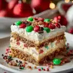 Delicious Christmas Dessert Lasagna with layers of creamy goodness and festive toppings