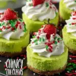 Festive Grinch Mini Cheesecakes with green topping and holiday decorations