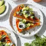 Delicious crustless taco pie served on a plate with toppings