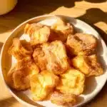 Delicious fried milk dessert with a crispy coating and creamy filling