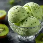 Delicious kiwi sorbet served in a bowl with fresh kiwi slices