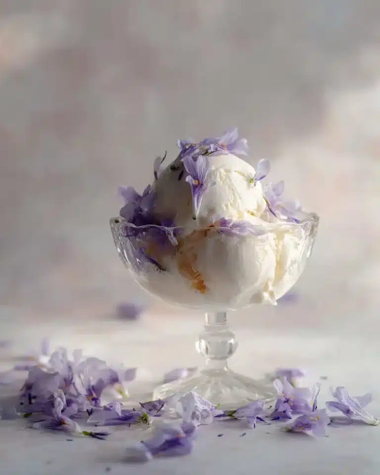 Delicious lavender ice cream served in a bowl with lavender sprigs