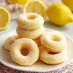 Delicious lemon sugar baked donuts topped with vibrant lemon zest.