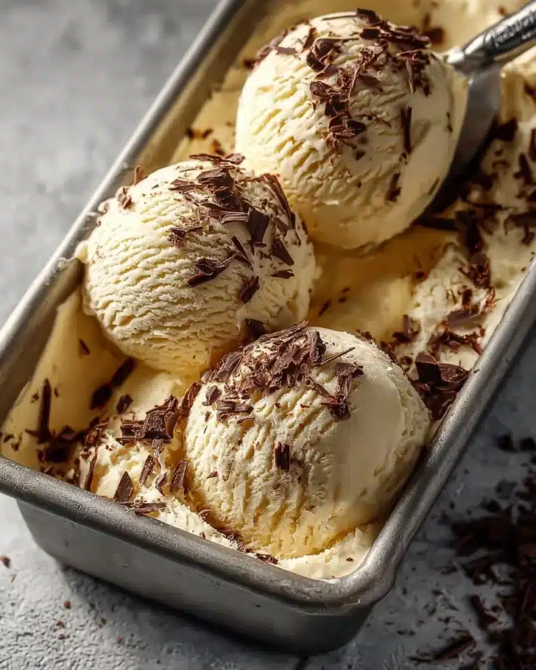 Delicious homemade tiramisu ice cream served in a bowl with chocolate shavings