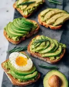Delicious avocado toast topped with creamy smashed avocado and seasonings