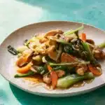Delicious chicken stir fry dish featuring fresh vegetables in Chop Suey style.