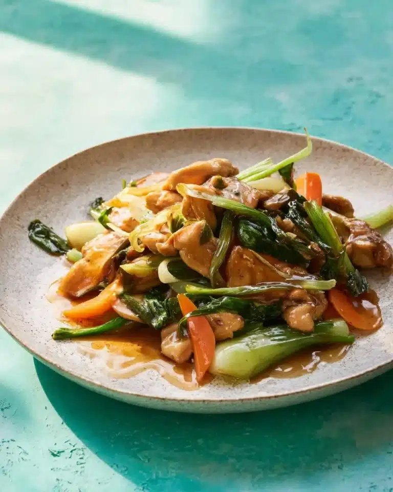 Delicious chicken stir fry dish featuring fresh vegetables in Chop Suey style.