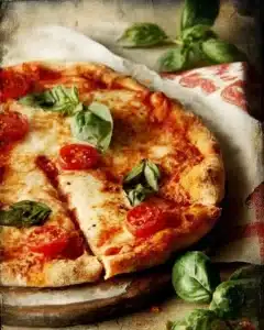 Homemade classic Neapolitan Margherita pizza with fresh basil and mozzarella