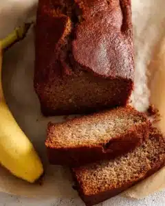 JB's Banana Bread 5 Slice of JB's delicious homemade banana bread on a wooden table