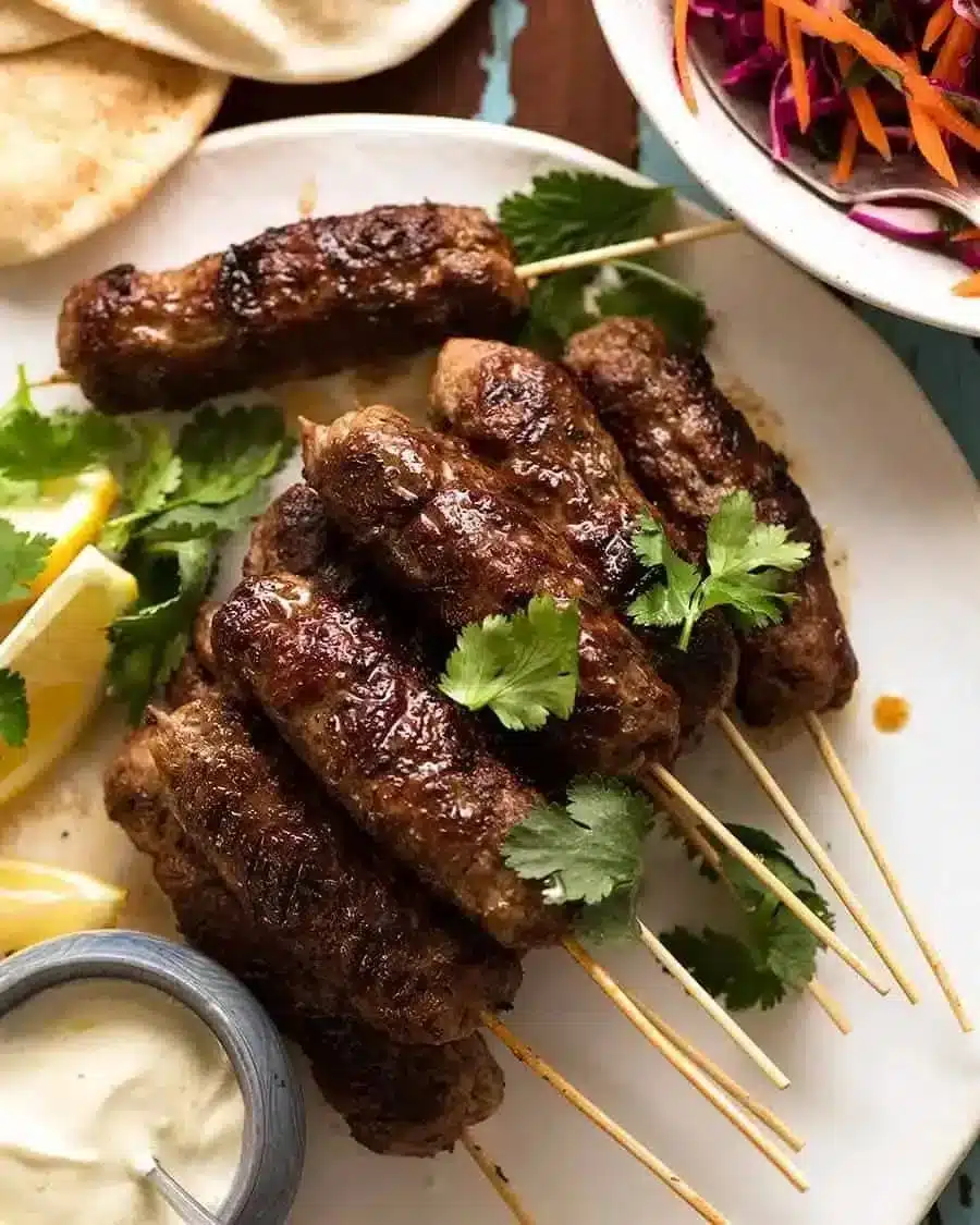 Delicious homemade quick and flavorful lamb koftas served with sauce.