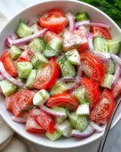 Simple Tomato Salad 3 Fresh and colorful simple tomato salad displayed in a bowl