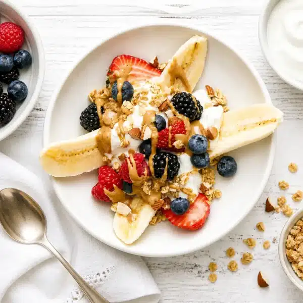 High fiber breakfast recipes with oatmeal, smoothies, and colorful fruits and veggies.