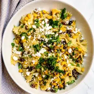 5-Minute Creamy Street Corn Pasta Salad You'll Love 5 Creamy street corn pasta salad with corn, cotija cheese, and a tangy dressing.