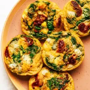 High protein egg bites with cottage cheese and various flavorful mix-ins.